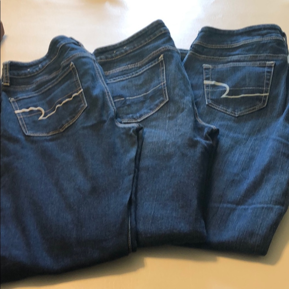 3 pair of jeans; two straight leg and one bootcut.